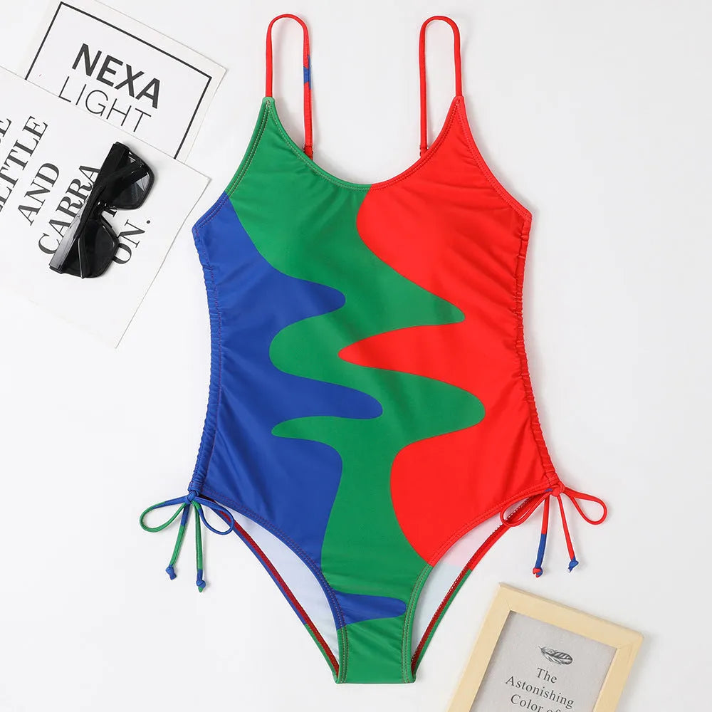 Women's sleeveless backless one-piece swimsuit in blue striped print