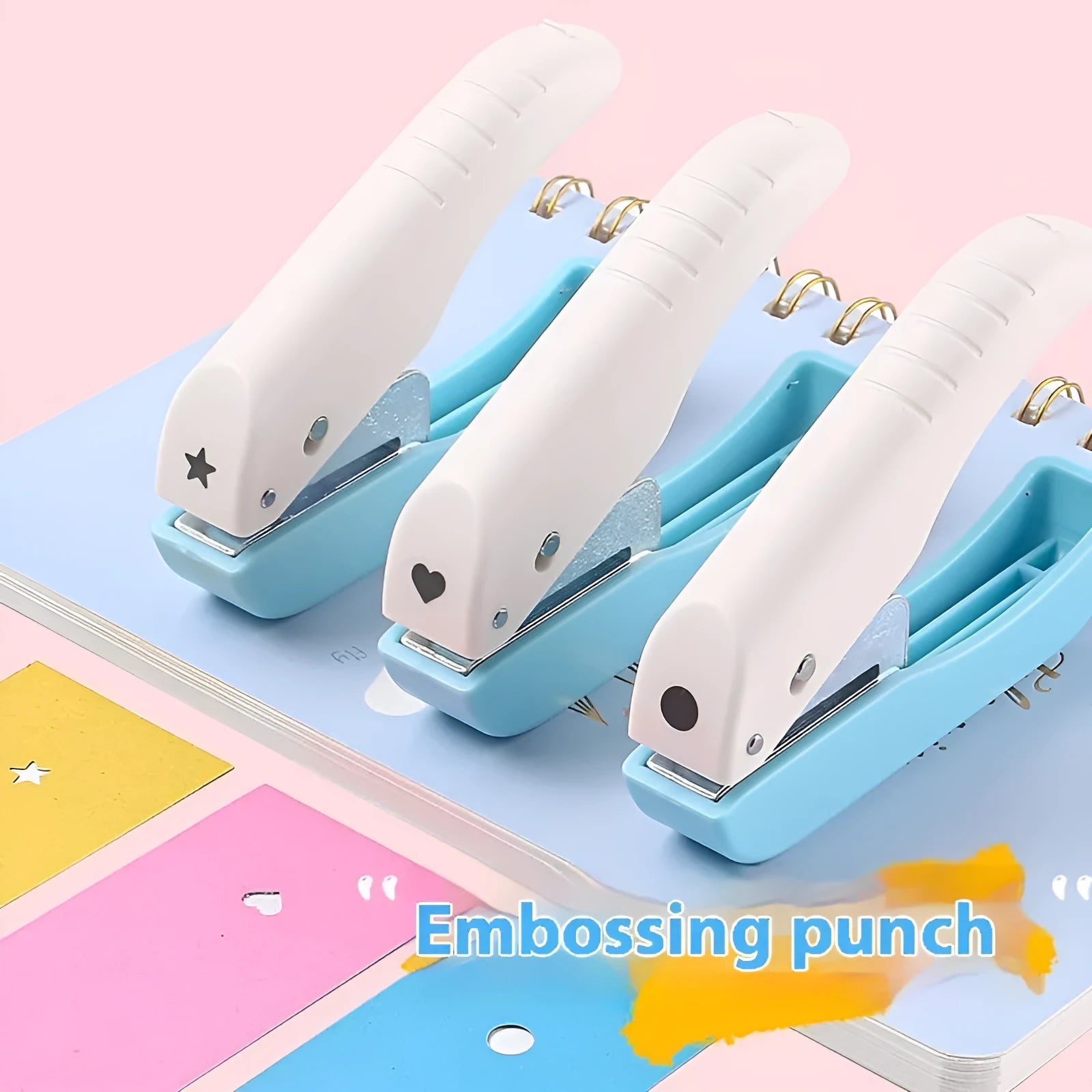 Manual handheld punching machine with love, star, and round pattern plates for paper craft.