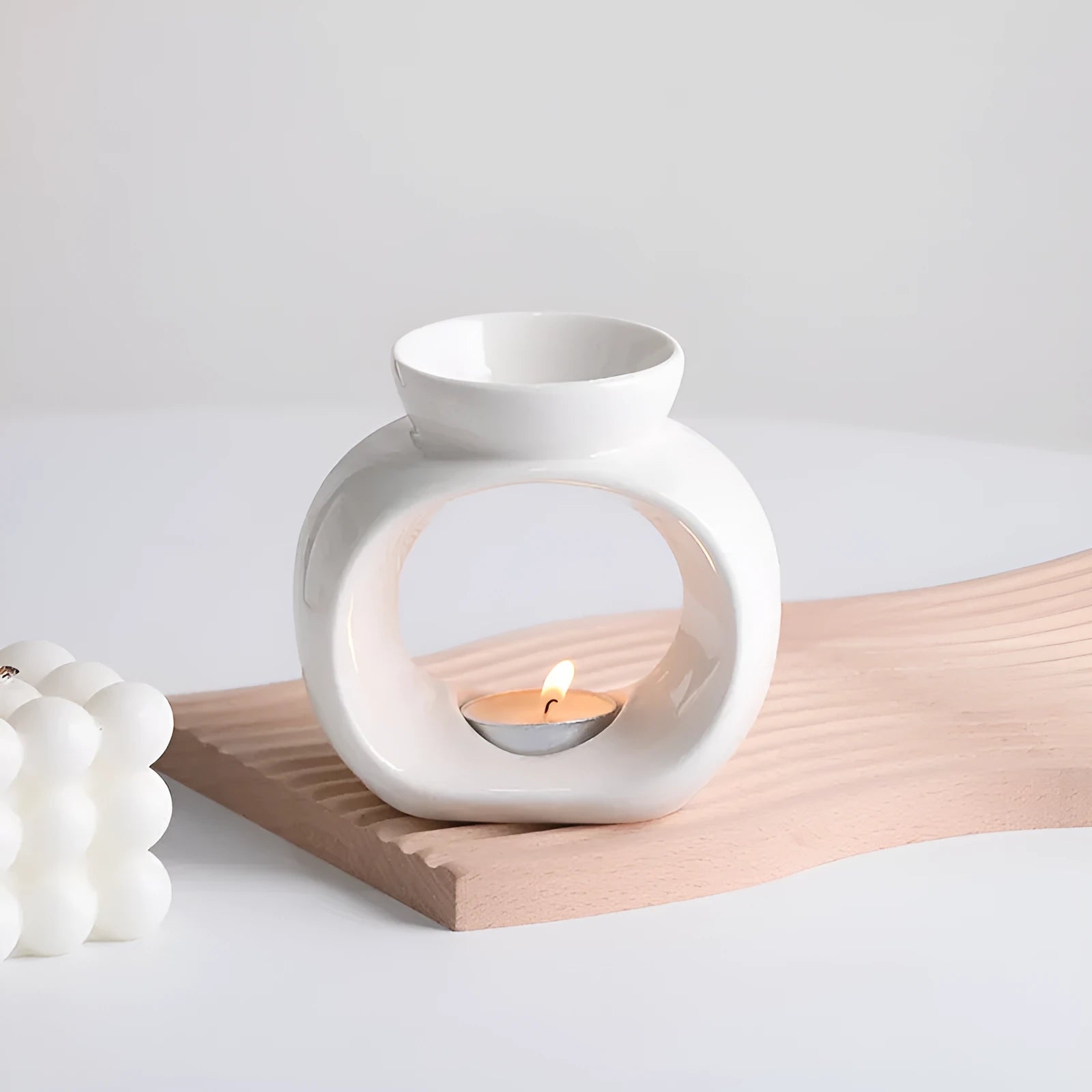 White Nordic style ceramic aromatherapy stove ornament with anti-dry burning design