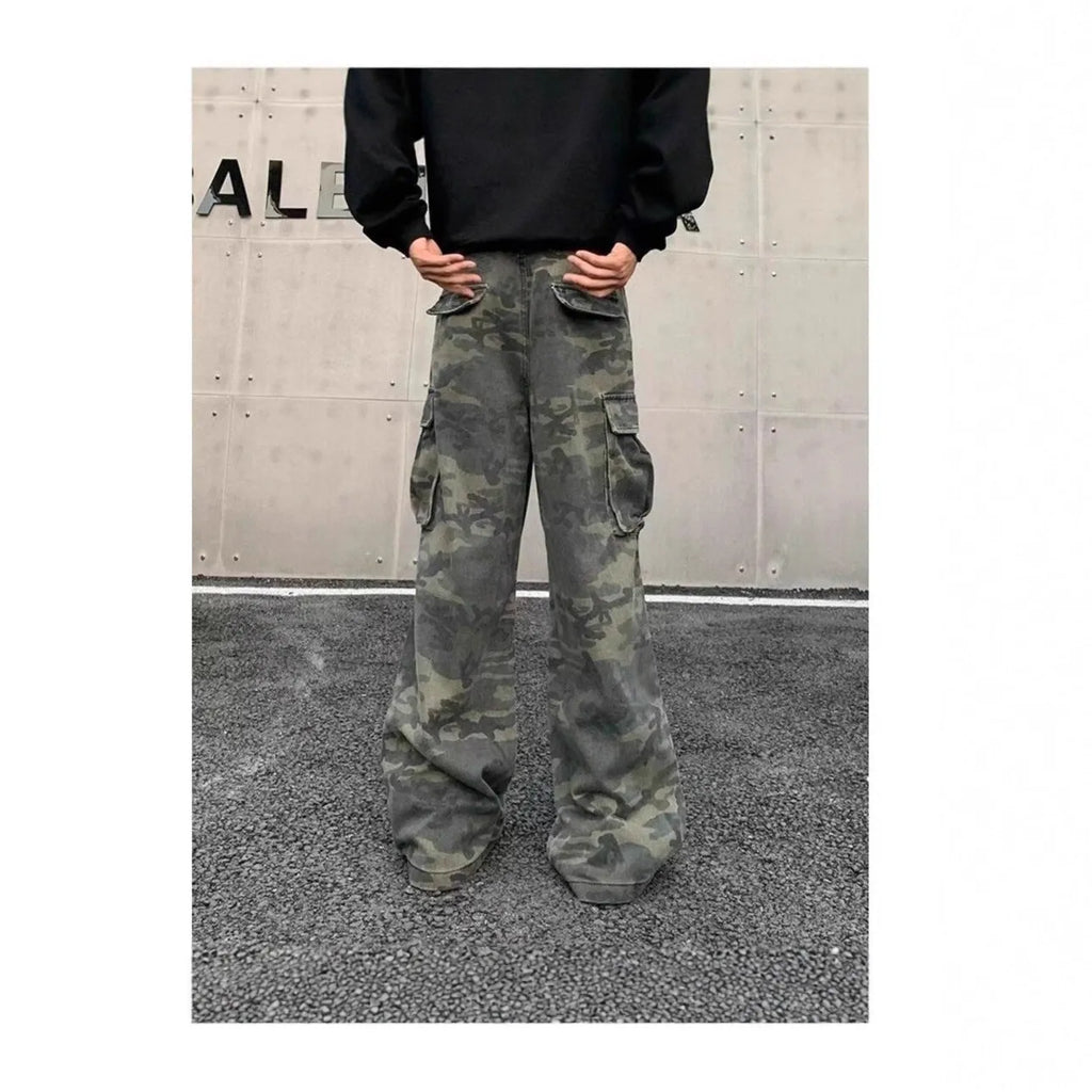 Men's loose-fit camouflage cargo pants with multiple pockets on a washed vintage-style fabric.
