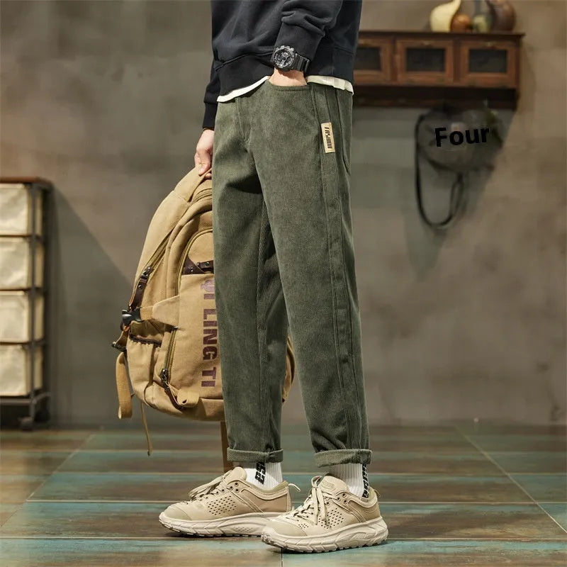 Men's corduroy casual trousers in tapered straight-leg design with street fashion styling