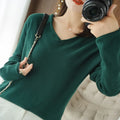 Women's V-neck long sleeve knitwear pullover top in turmeric colour with non-ironing finish