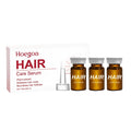 Three 5ml glass ampoules of nourishing hair root liquid with ginger and rosemary oil for thinning hair