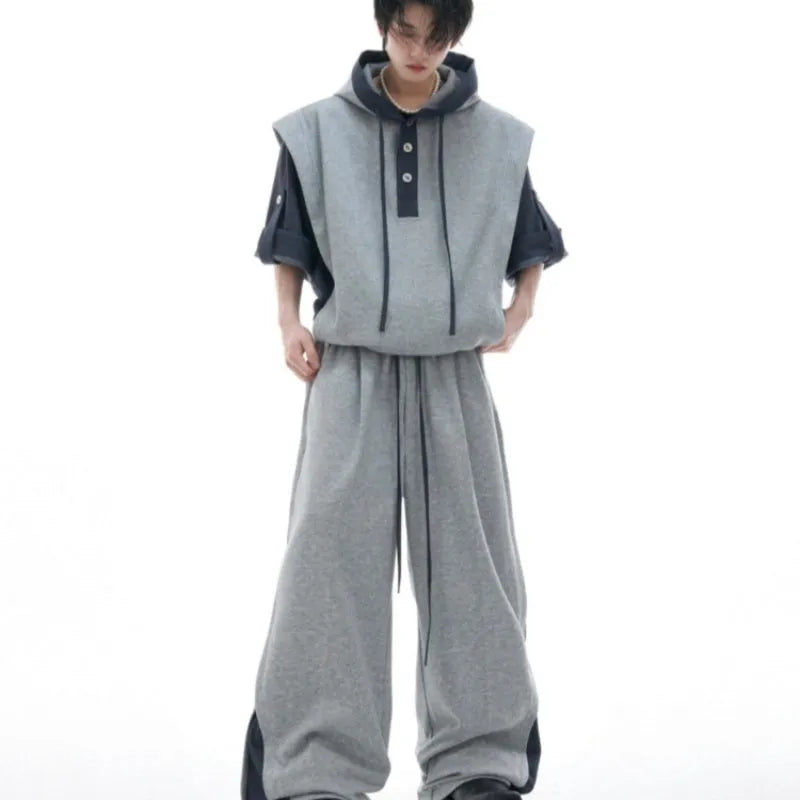 Men's black polyester hooded sports jacket with three-dimensional stitching and matching trousers