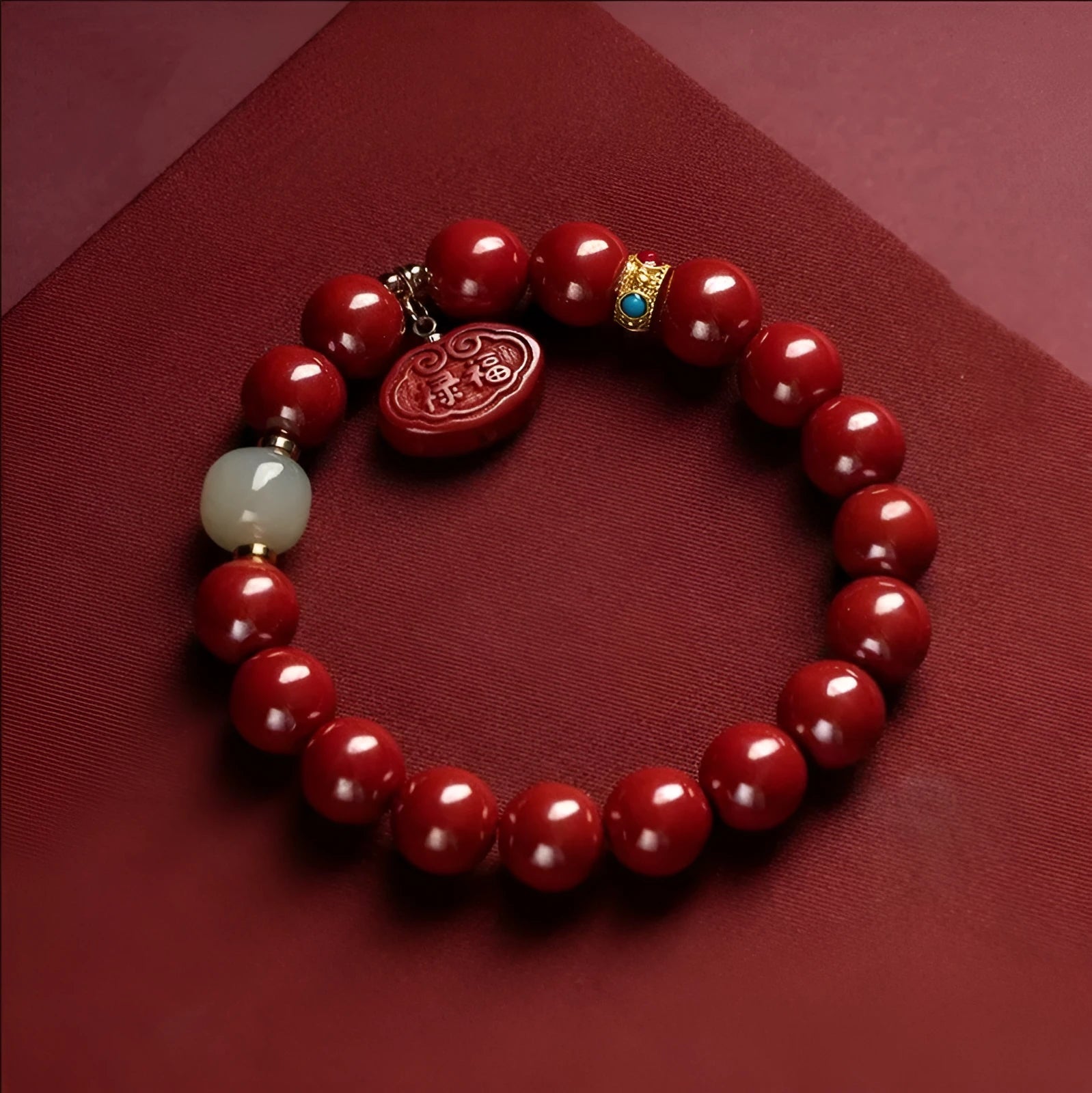Natural cinnabar Emperor sandstone bracelet with traditional Ping An Fu Lu motifs