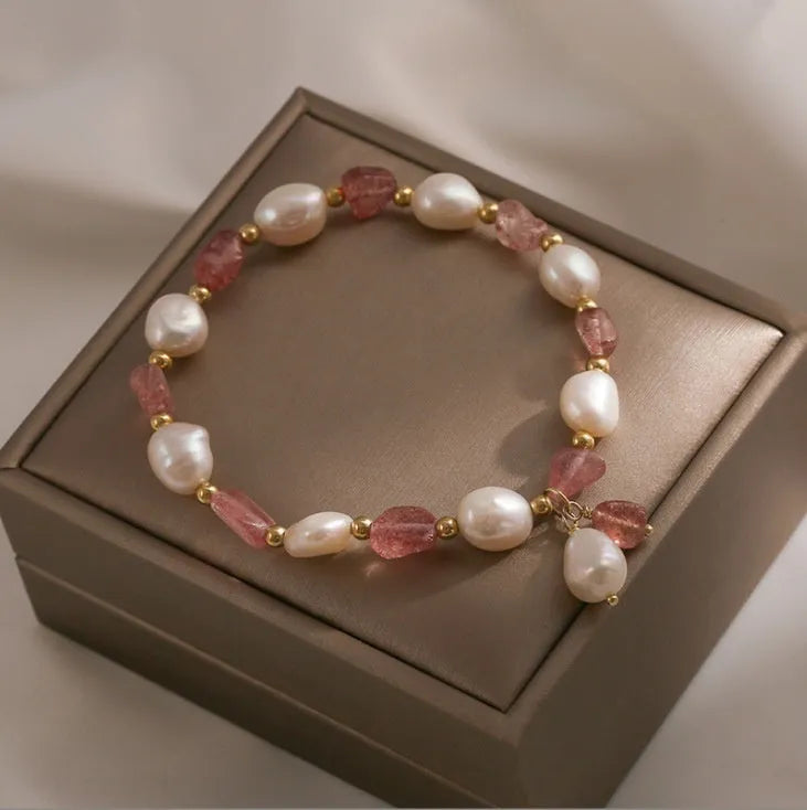 Handmade women's bracelet with Hetian jade and strawberry quartz crystals in peach blossom design