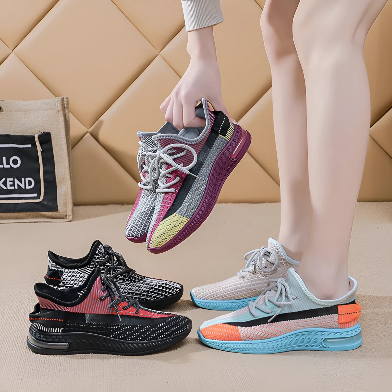 Women's lightweight casual running shoe in purple with front lace-up, round toe, and flat heel.