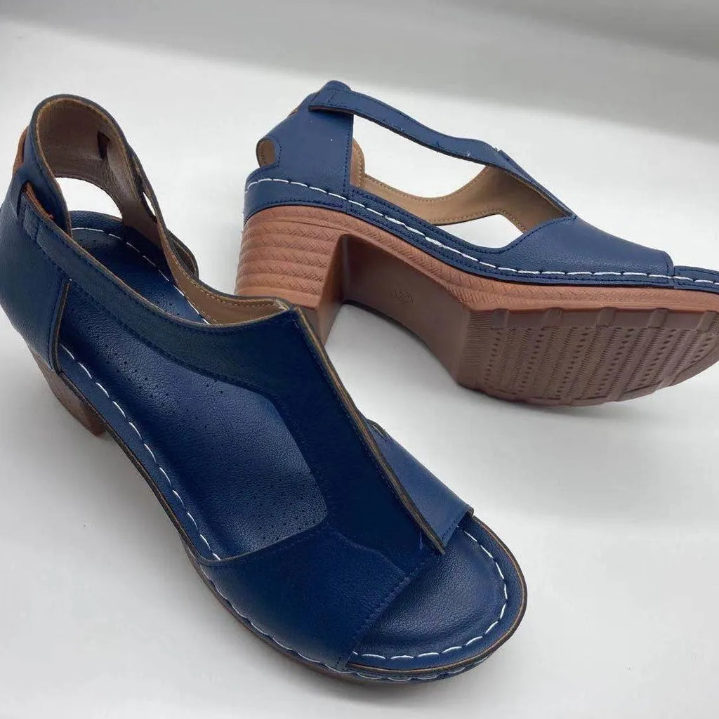 Women's peep toe wedge sandal with buckle on low heel, open fish mouth toe, in light brown