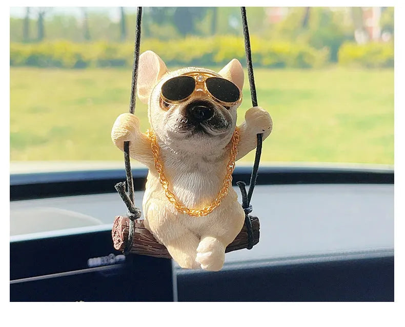 Cartoon-style resin bulldog car pendant hanging ornament in black, white, or yellow.