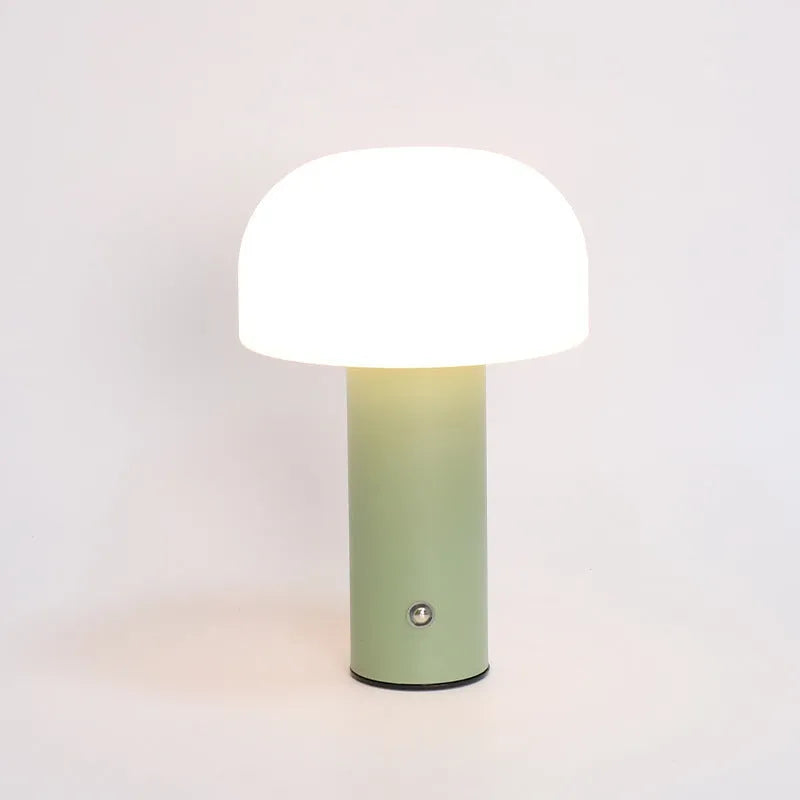 USB-powered decorative atmosphere table lamp in black, green, orange, or white plastic.