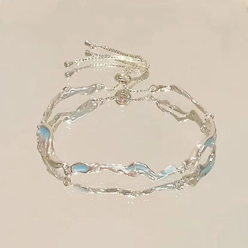 Fashion crystal zircon alloy bracelet for women in electroplated finish with blue wave design