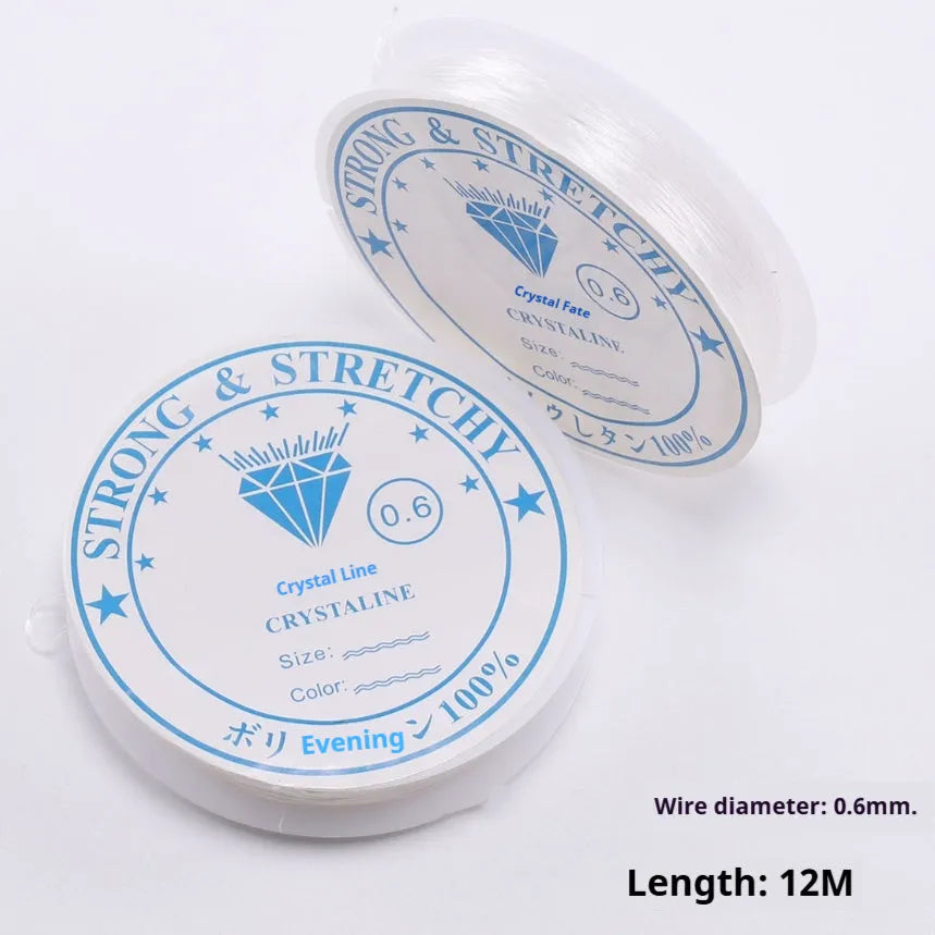 Close-up of transparent white elastic cord reel with beads, showing diameters from 0.4mm to 1mm for jewellery making.