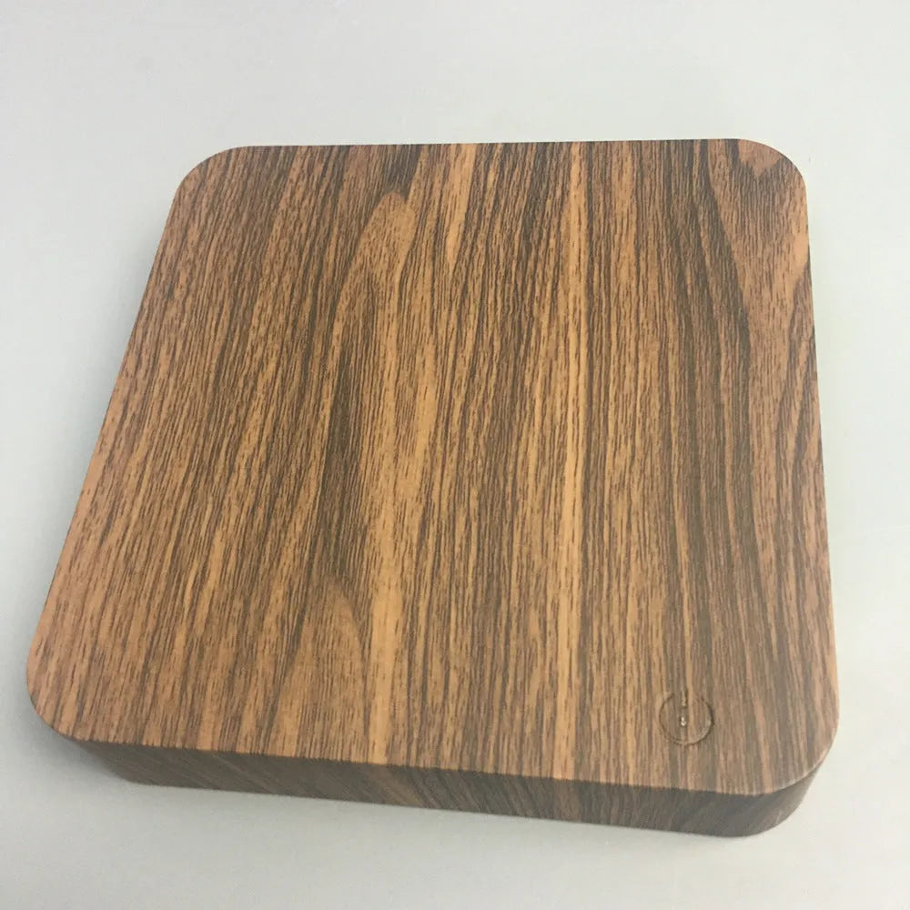 Walnut-colour base with a floating galaxy moon lamp levitating above it, showing starry sky details.