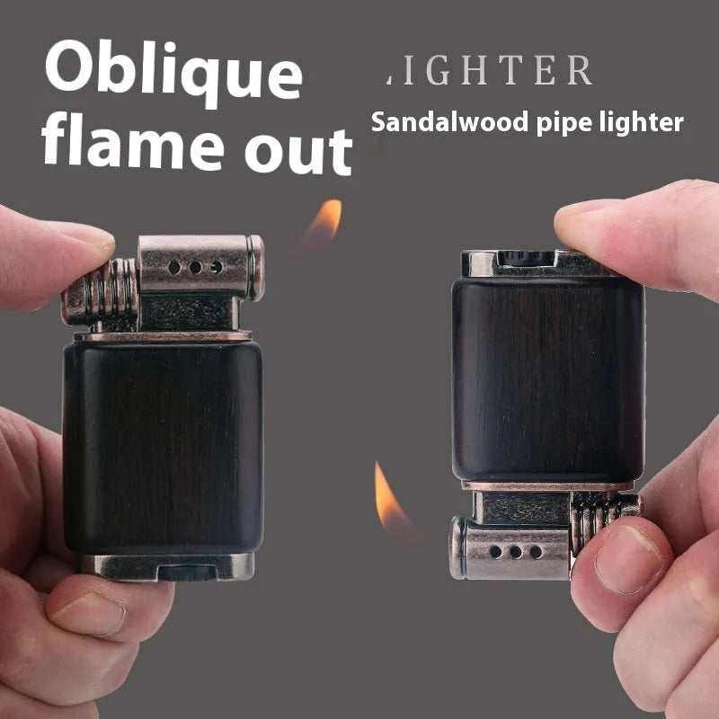 A decorative gas lighter with a carved wooden handle combining black wood, rosewood symbols, and a red wood tube accent.