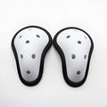 Rubber sports genital protector shown in adult and children's size options.