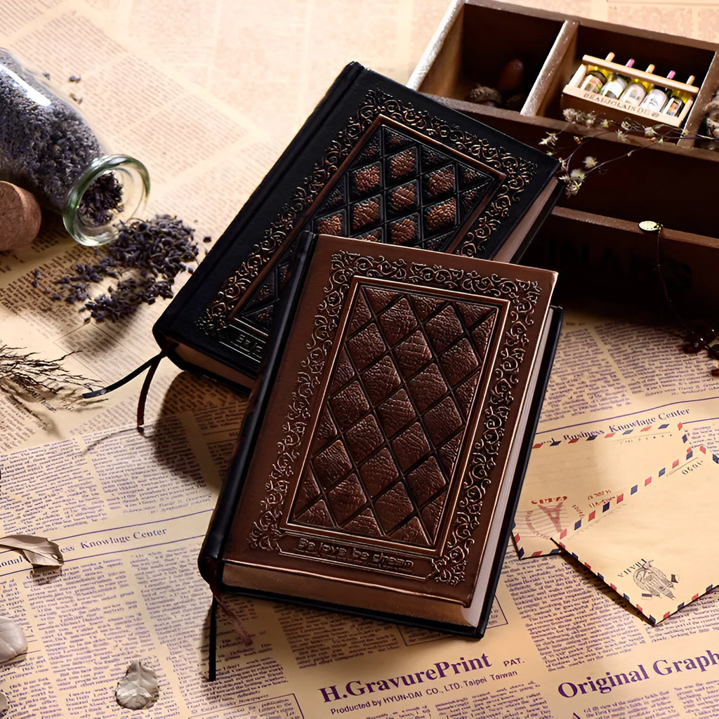 Embossed faux leather notebook with textured three-dimensional cover in bronze colour option