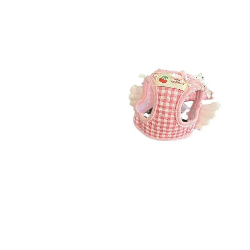 Soft cotton chest and back harness for a small dog, with hand-holding rope, shown in pink colour.