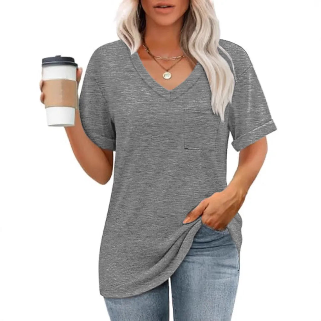 Grey men's loose fit V-neck t-shirt with a chest pocket, short sleeves, on a solid background.