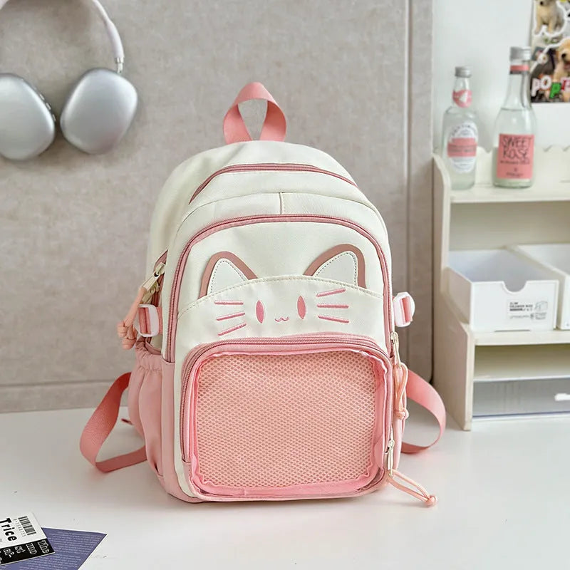 Korean cartoon backpack in multiple colours with curved shoulder straps and badge pendant options