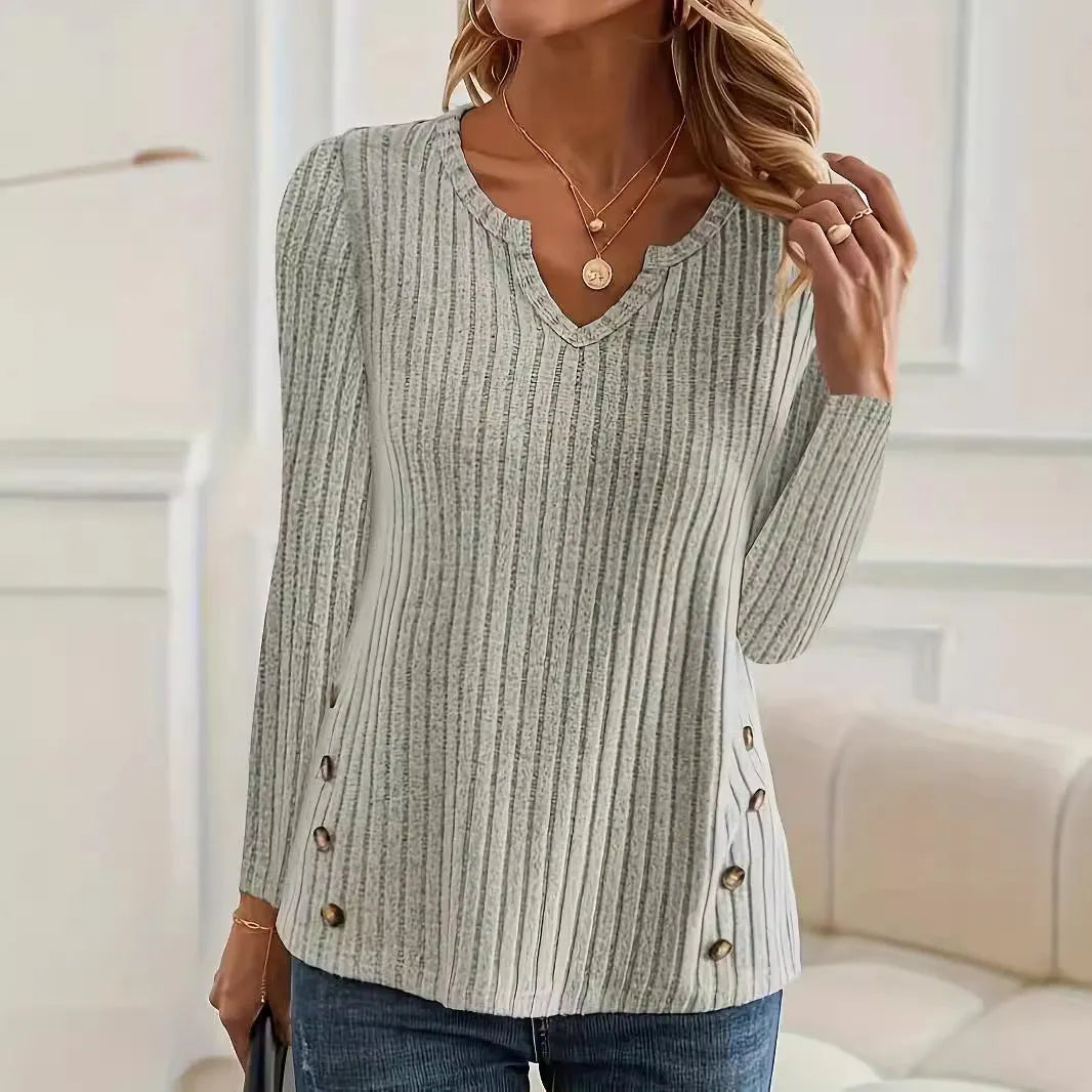 Casual grey green knitted button sweater on a hanger, showing regular sleeves and pullover style.