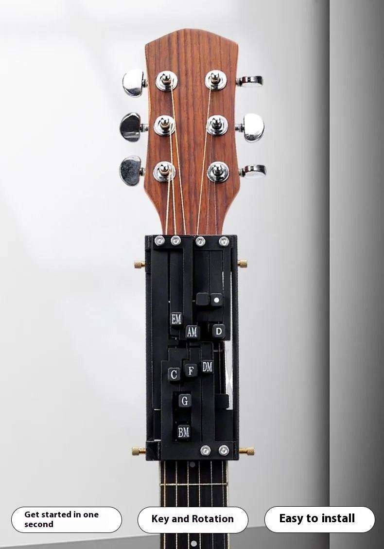 Black auxiliary guitar chord maker device with automatic gear for novice second chord practice.