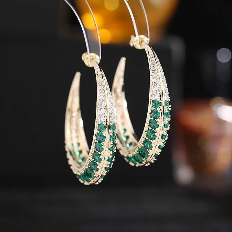 Geometric copper hoop earrings with zirconium accents in gold white, purple, green, black, or silver white.