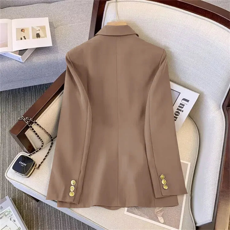 Women's loose fit polyester blouse in black on a hanger, showing regular sleeves and a front view.