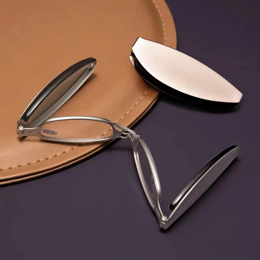 Folding presbyopic glasses in black retro frame showing folded and open positions