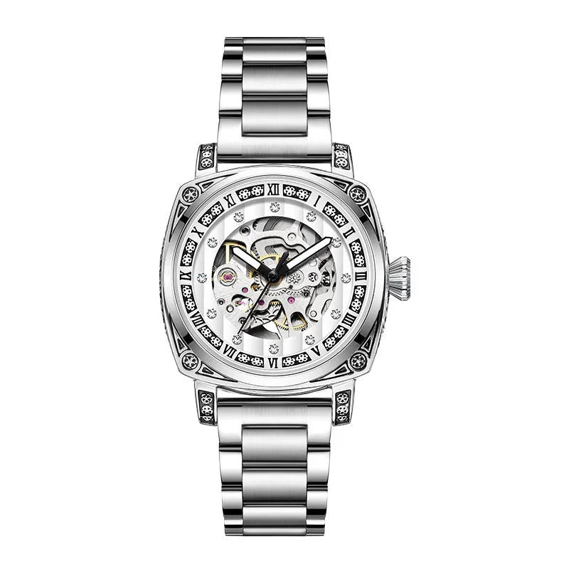 Men's black leather strap mechanical watch with luminous hands on a wrist.