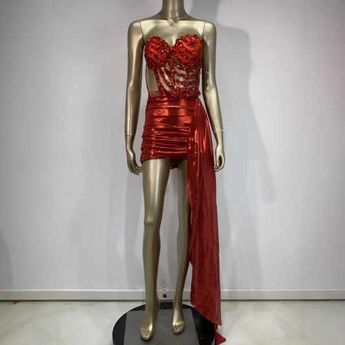 Red women's spandex skirt suit with see-through hollow mesh panels for stage performance.