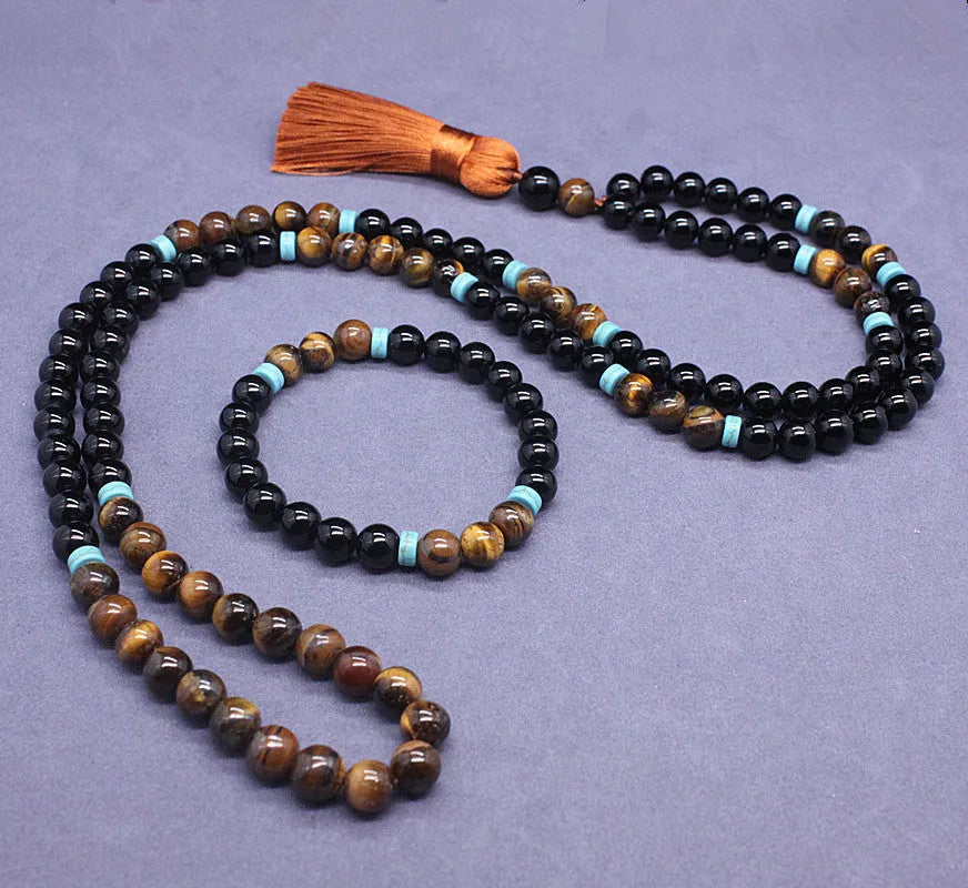 Black agate and tiger's eye geometric beaded bracelet and necklace set.