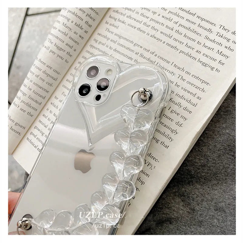 Transparent iPhone case with love bracelet chain design for Apple models 7 through 13 Pro Max
