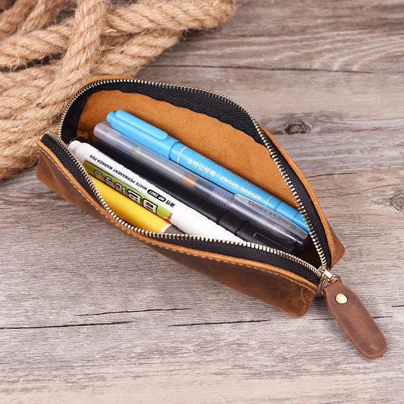 Genuine cowhide leather pencil case with zipper closure measuring 18cm long