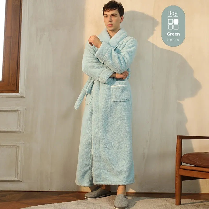 A man and woman wearing matching thick, navy blue flannel bathrobes in a European style cut.