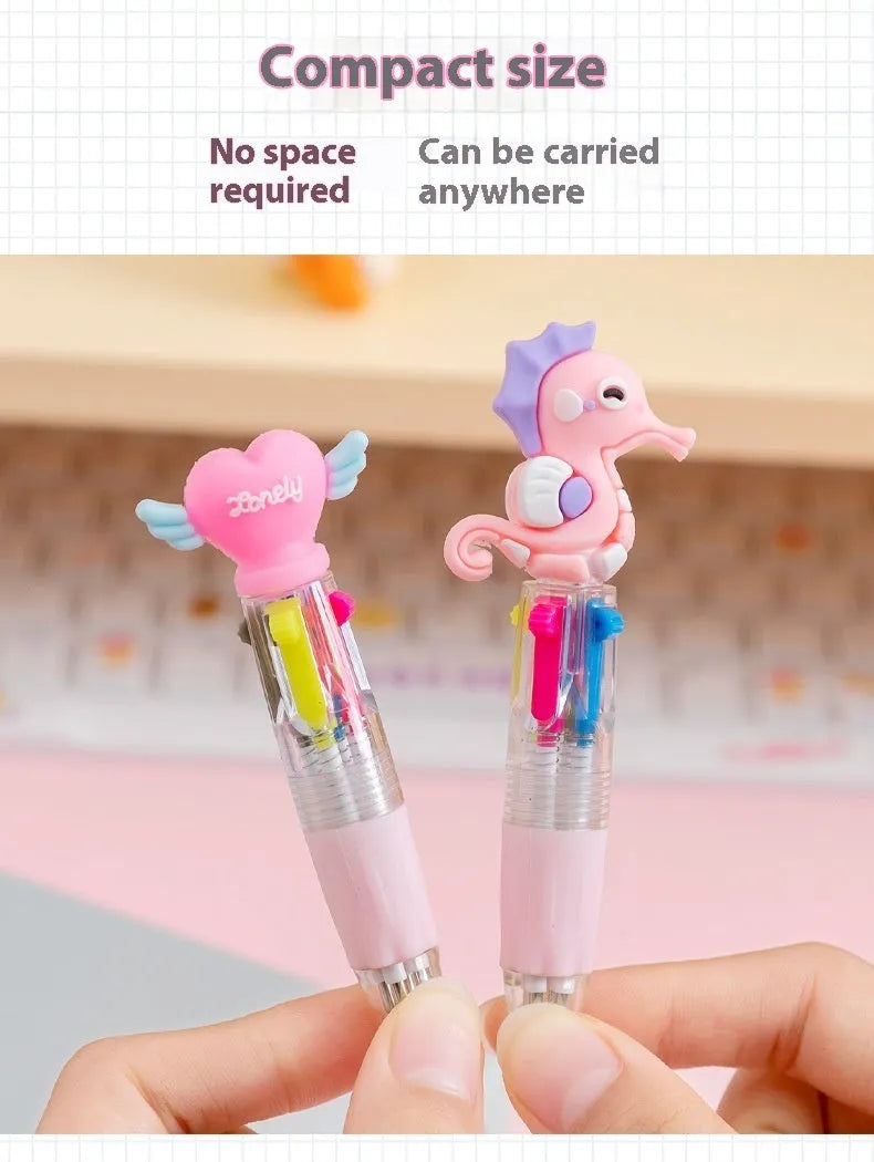 A press-action ballpoint pen with a four-colour cartridge, showing one of five random cartoon designs on the barrel.