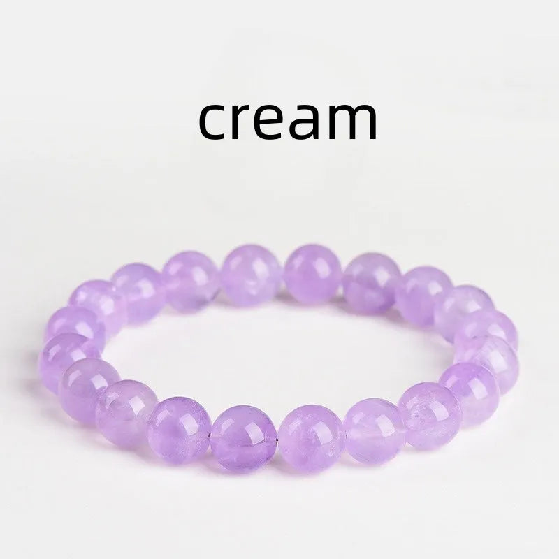 Lavender coloured amethyst crystal bead bracelet with round geometry shape and water ripple design.