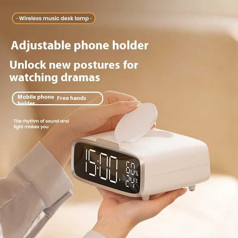 White wireless charging speaker alarm clock with Bluetooth and night light functions