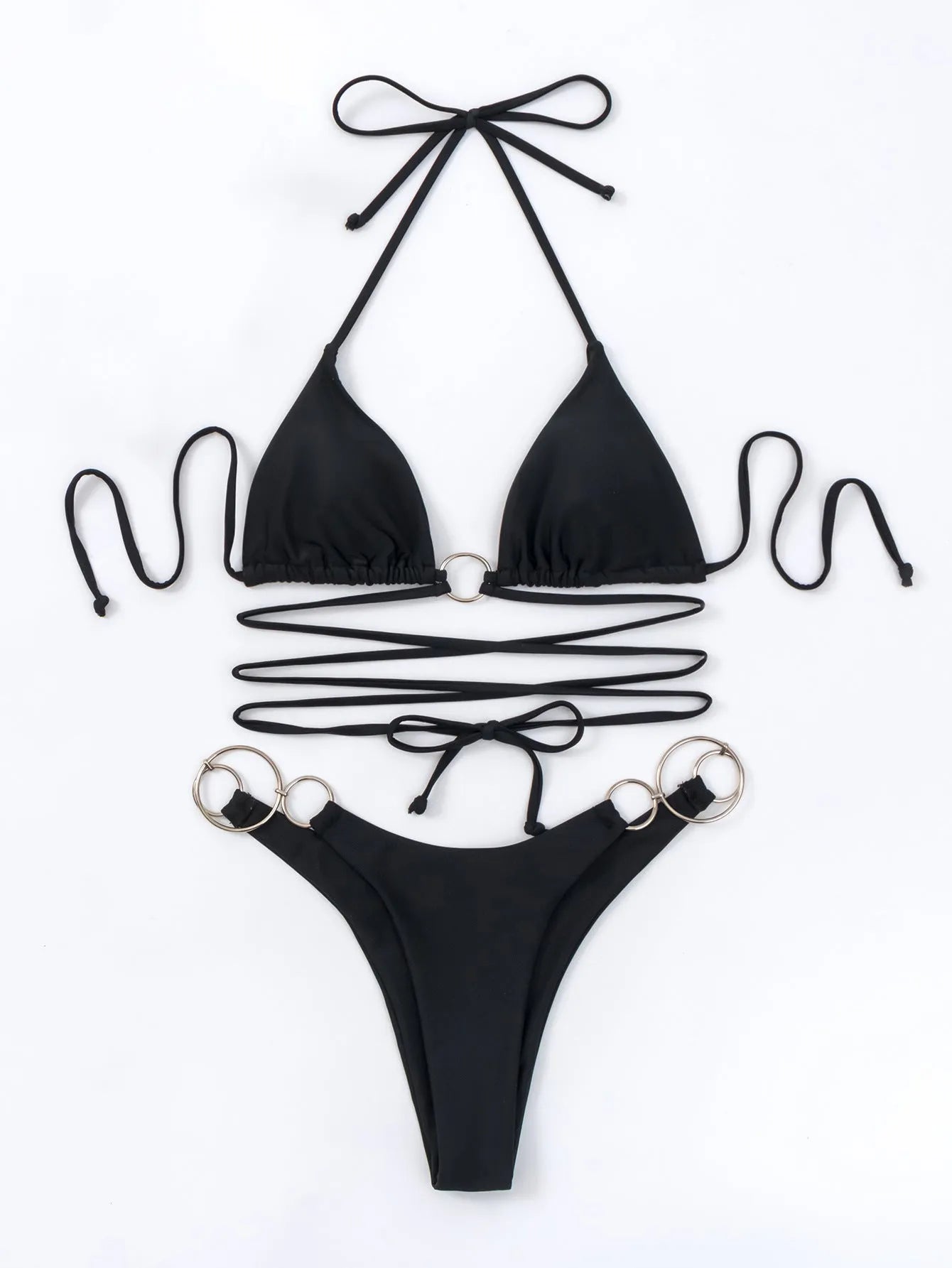 Black women's bikini set with long straps and a metal ring, shown on a model.