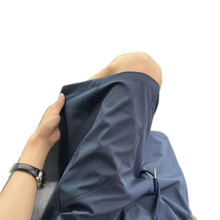 Men's quick-dry polyester sports shorts in straight-leg style with elastic waistband