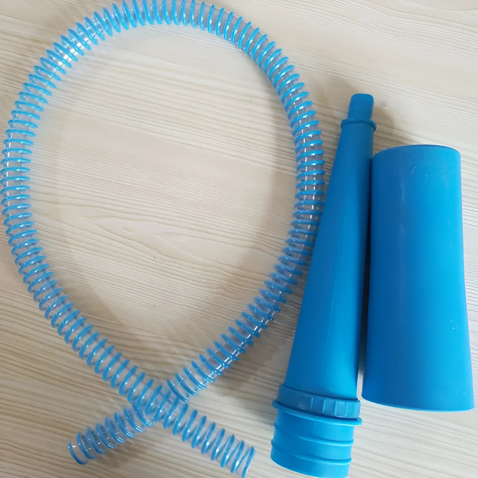 Blue plastic suction pipe cleaner with round head for washing machine maintenance