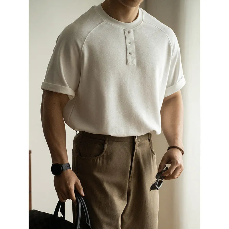 Casual loose top with terry texture fabric and raglan sleeves in three colour options