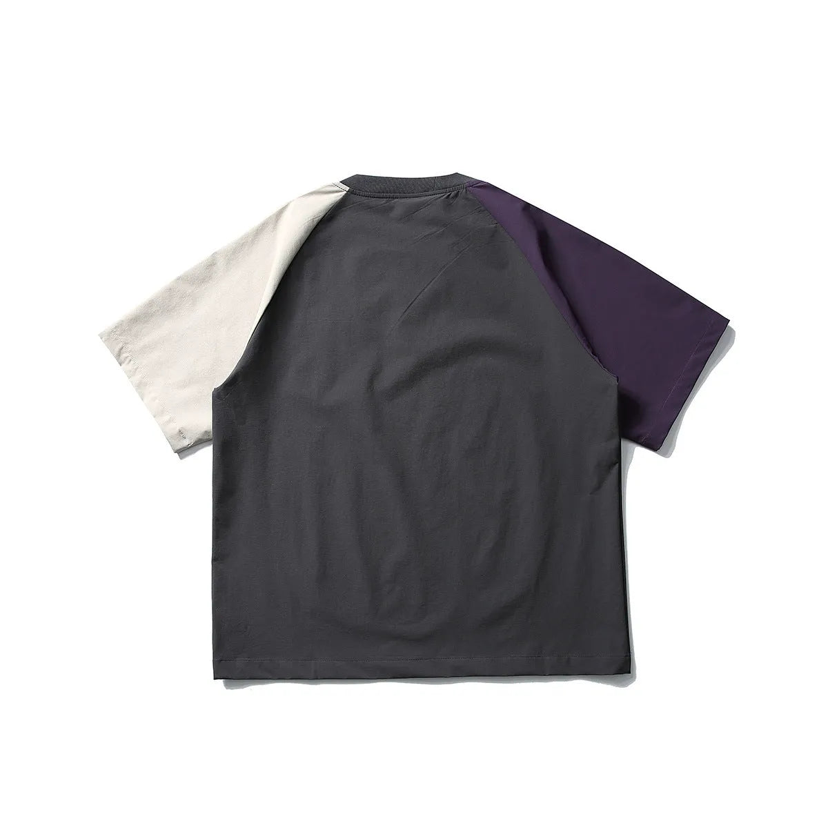 Dark grey men's t-shirt with contrast colour panels and raglan sleeves laid flat.