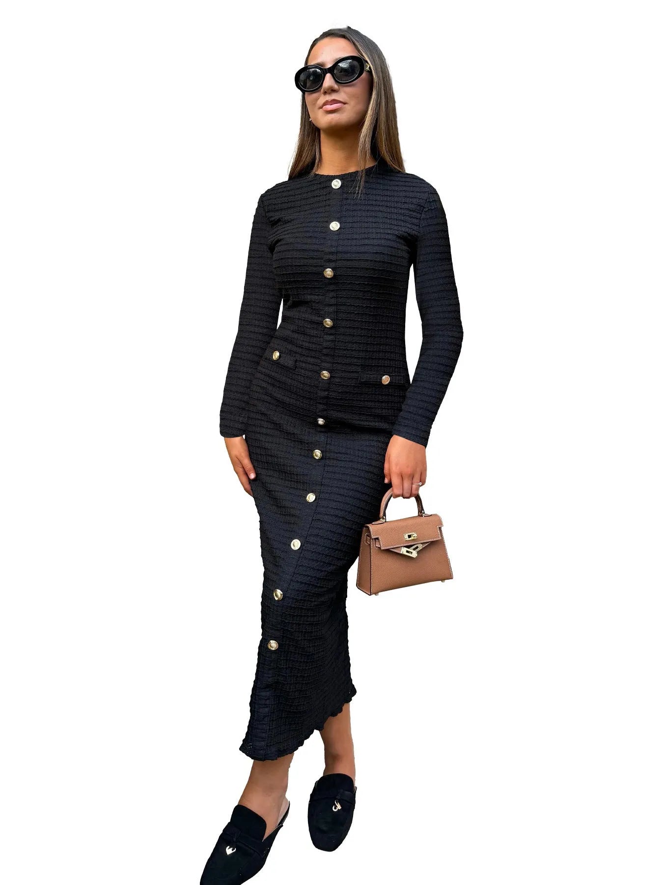 Black slim fit French retro knitted long sleeve dress with button detail on mannequin.