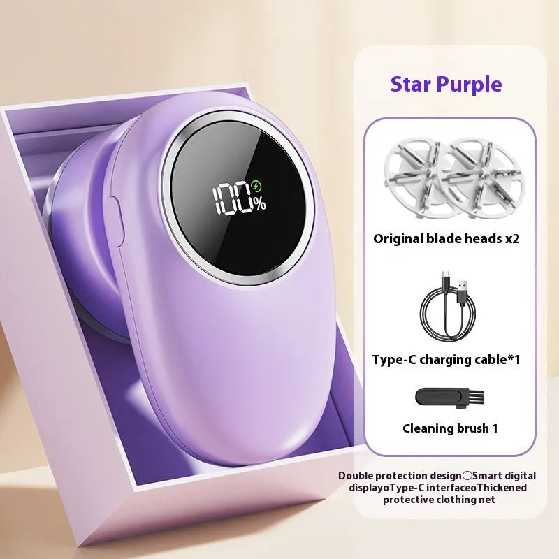 Beige and purple digital fur ball trimmer lint remover with selectable cutter heads on a table