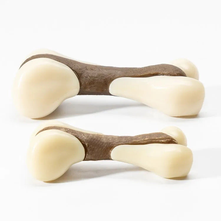 Cowhide and nylon bone grinding rod dog chew toy in two size options.