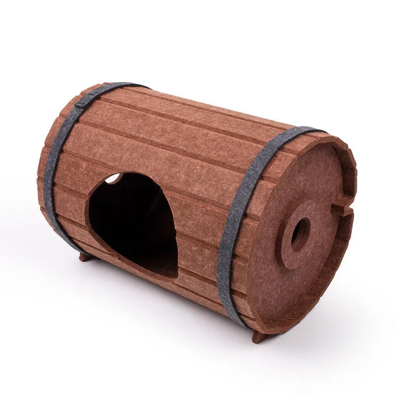 Assembled wine barrel shaped cat bed made from polyester fibre felt, showing three pieces and two straps.