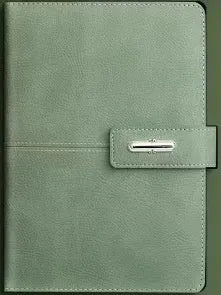 A5 notebook with PU leather cover in choice of colour, shown open on wood-free paper pages.
