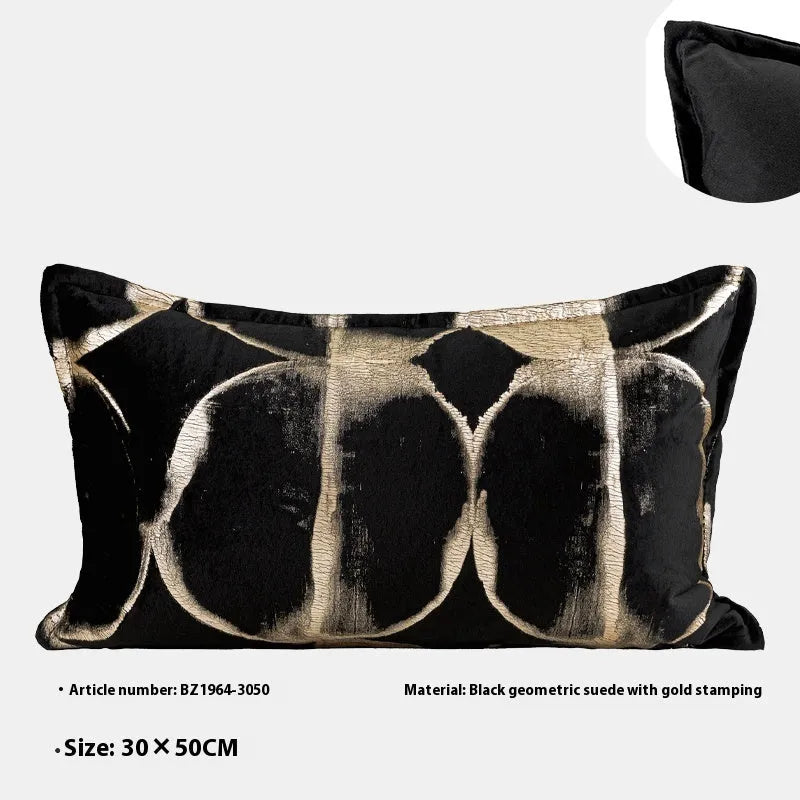 Black and gold abstract pattern flannel cushion cover on a sofa