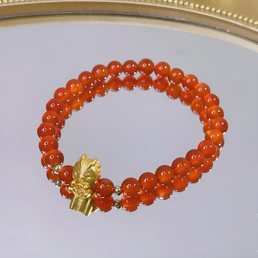Chinese style red agate bracelet for women with dragon design, manual craftsmanship.
