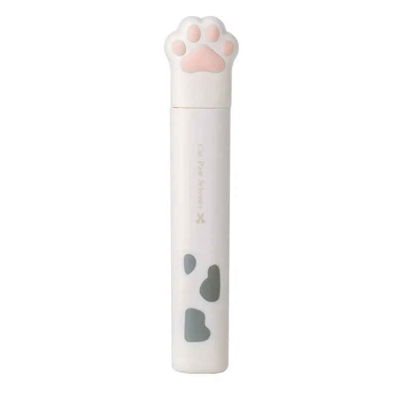 Set of four mini folding scissors with cat paw design in black, blue, pink, and white colours on a plain surface.